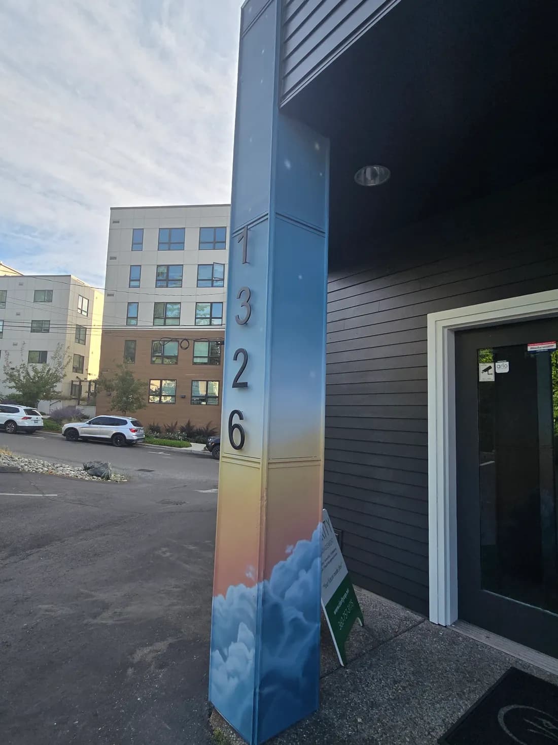 The painted 1326 address pillar marking the entrance to the Clarity Tax and CPAs office on E Laurel Street in Bellingham